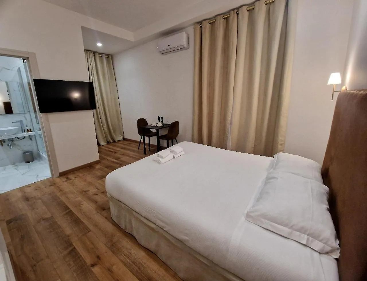 Cuma Suites Rome Couette-café